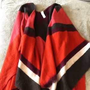 cardigan IS LIKE A BLANKET YOU LAY ON SHOULDERS.